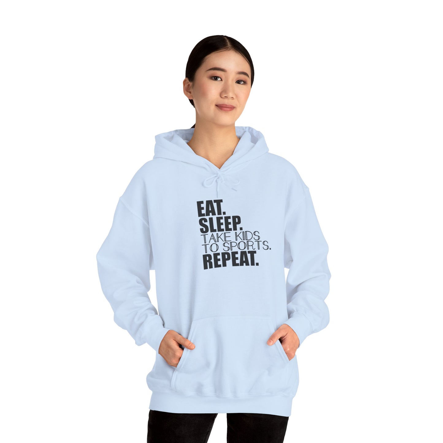 Unisex Heavy Blend™ Hooded Sweatshirt Reads, " Eat. Sleep. Take Kids to Sports. Repeat.